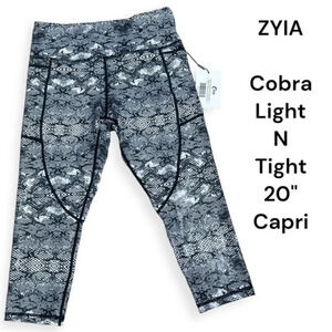 ZYIA light n tight high rise black and white cobra print capri size M 8-10